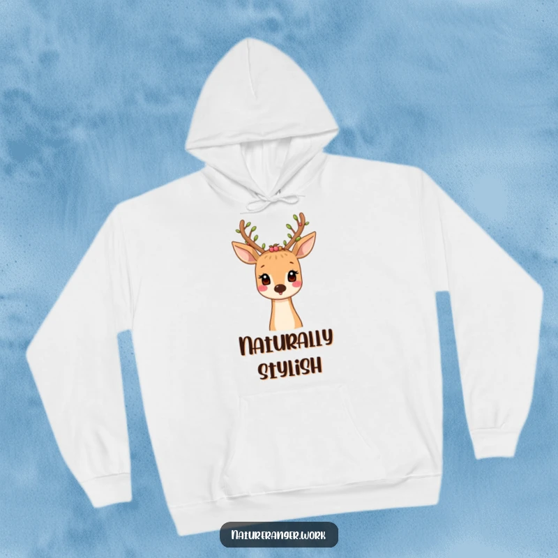 Funny hoodie illustration of a smiling cartoon deer with foliage and berry-adorned antlers, embodying forest serenity.